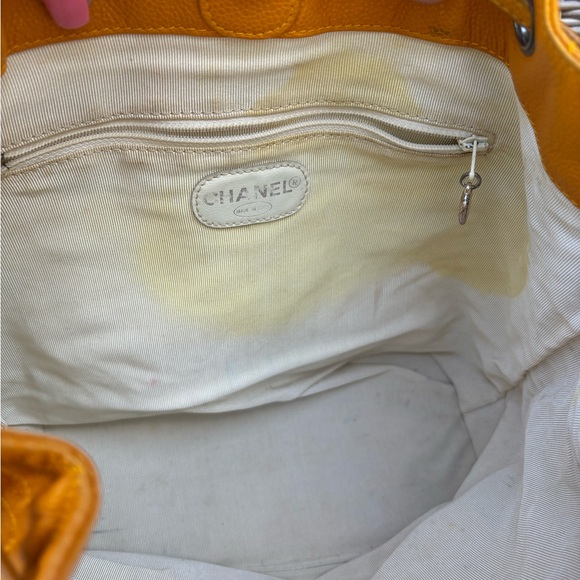 Authentic CHANEL Mustard caviar leather quilted drawstring backpack main image 9